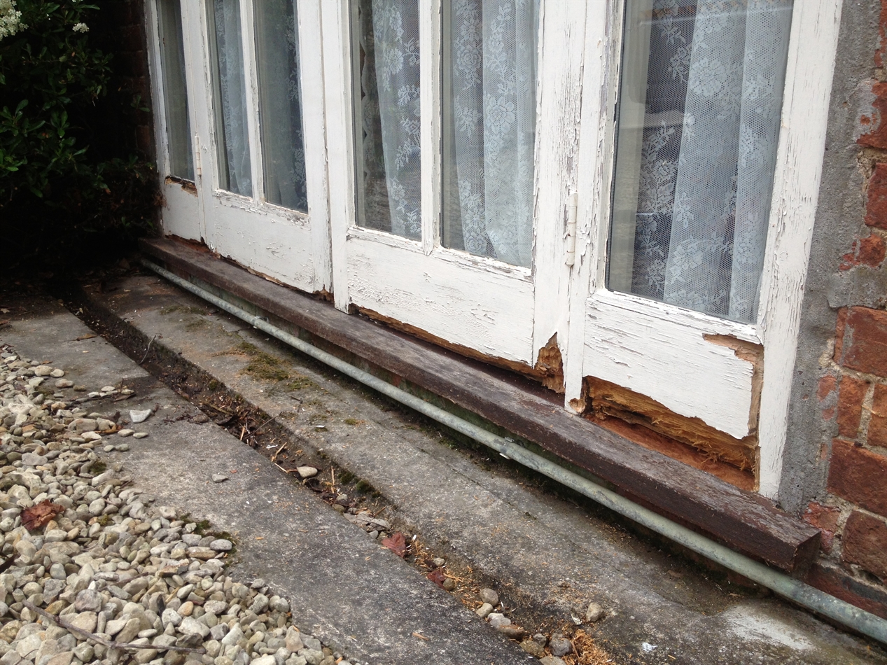 After all decayed timber had been removed.