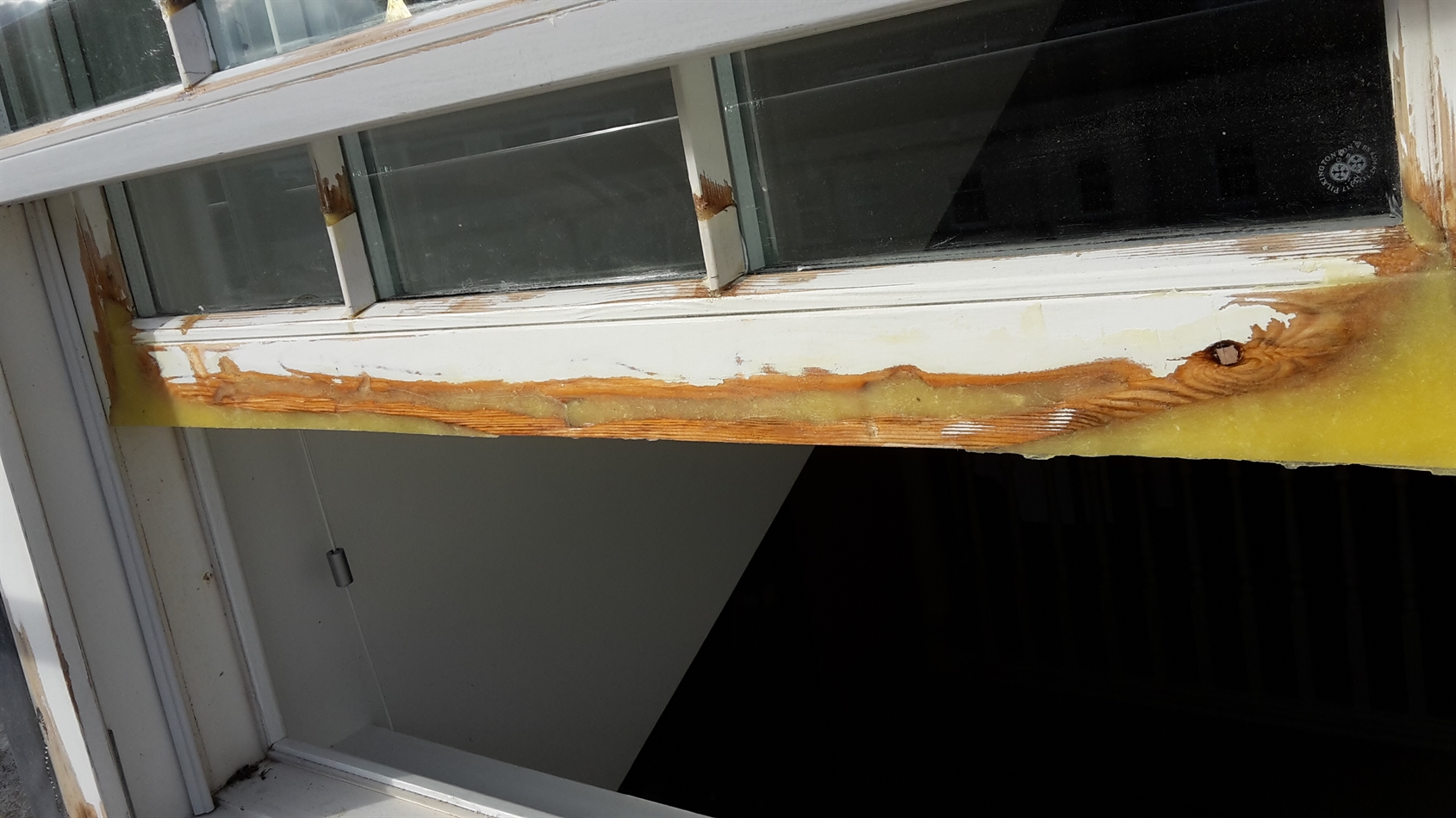 Repair underway. Note new glazing bead in.