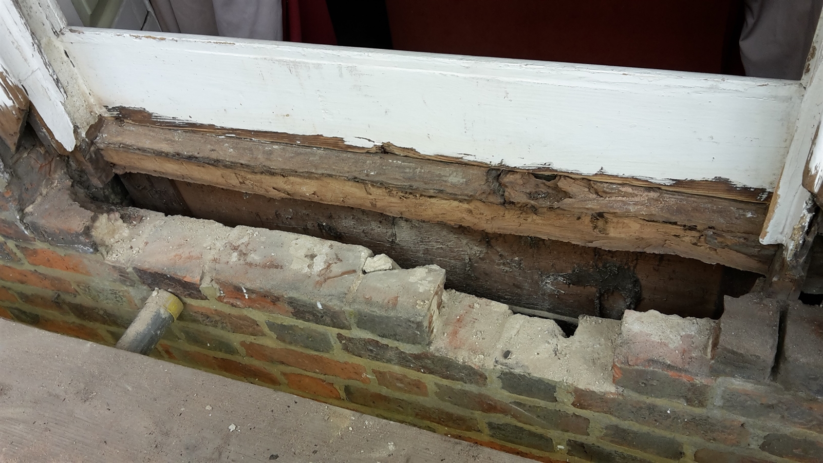 One the lead was removed and the remainder of the sill the brick work below came away.