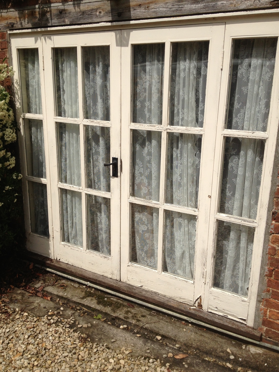Tired doors needing repair.