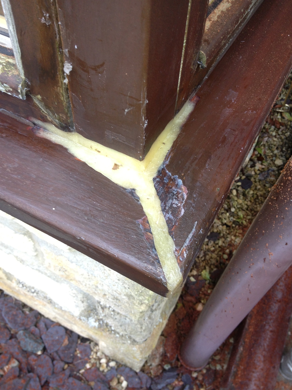 Water damaged junction of sill repaired ready for sanding.