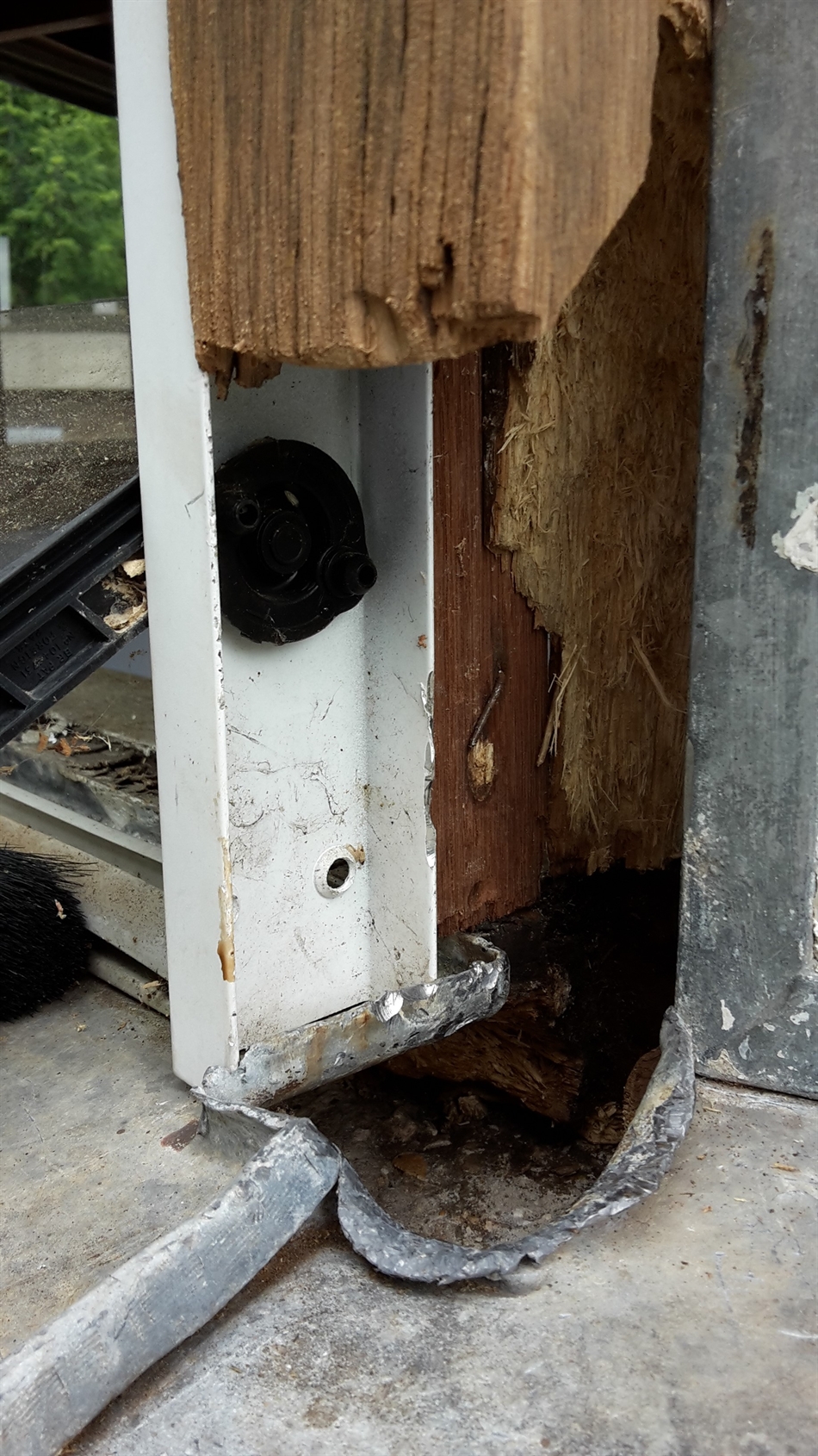 Louver window mechanism exposed.